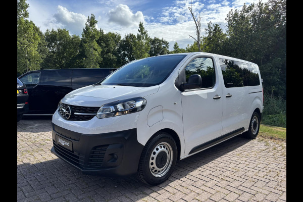 Opel Vivaro-e Combi L2H1 50 kWh 136 PK | 9.585 KM! | Climate Control | 9-persoons | Dubbele Zij-Schuifdeur | Privacy-Glass
