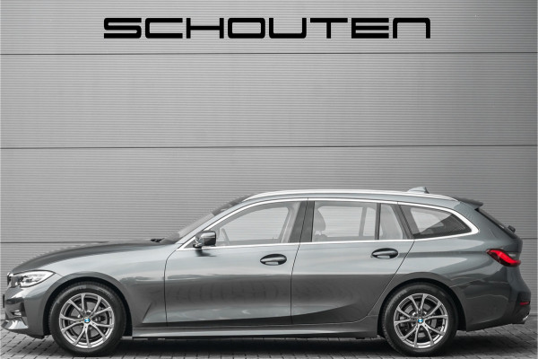 BMW 3 Serie Touring 320i High Executive Sportline Stoelverw Camera HiFi 17"