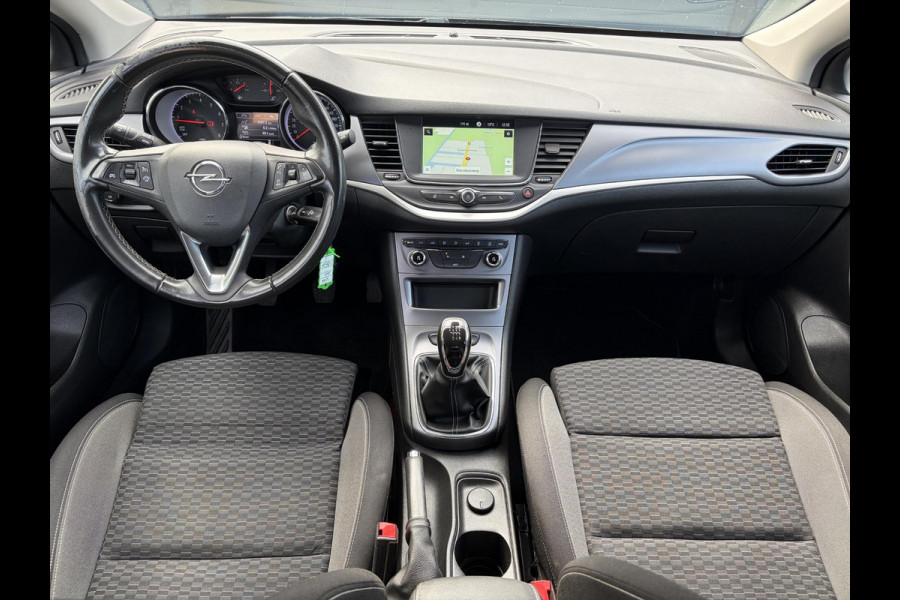 Opel Astra 1.2 Business Edition 147pk l 2e Eigenaar l Trekhaak l Navi l Carplay l 6 Bak l Clima l Cruise l Pdc V+A l Recent beurt gehad l Lm velgen l N.A.P l Apk tot 07-2028