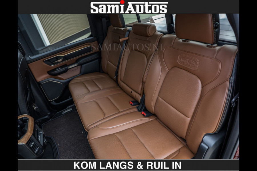 Dodge Ram LONGHORN | WIDE BODY | 5.7 V8 | BREDE WIELEN | BOM VOL | HUD | BRUIN LEDER | LUCHTVERING | PANODAK | RONDOM CAMERA | OPEN UITLAA DUBBELE CABINE | 5 PERSOONS | CREW CAB DC | SPECIAL ONE | DEALER ONDERHOUDEN | Eerste eigenaar |