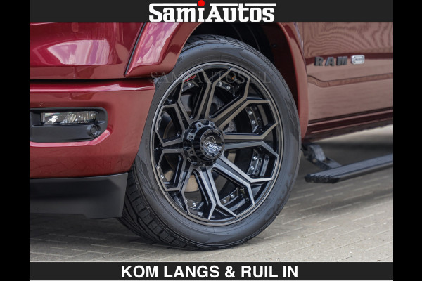 Dodge Ram LONGHORN | WIDE BODY | 5.7 V8 | BREDE WIELEN | BOM VOL | HUD | BRUIN LEDER | LUCHTVERING | PANODAK | RONDOM CAMERA | OPEN UITLAA DUBBELE CABINE | 5 PERSOONS | CREW CAB DC | SPECIAL ONE | DEALER ONDERHOUDEN | Eerste eigenaar |