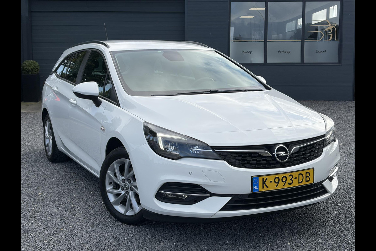 Opel Astra Sports Tourer 1.2 Edition ✓Camera ✓110pk✓2e Eigenaar✓Carplay✓Navi✓Airco✓Cruise✓Pdc✓LED koplampen✓N.A.P.✓6 Bak✓Pdc V+A✓Lm velgen✓Dakdragers ✓Comfortstoelen✓Bj 11-2020✓Apk tot 07-2028