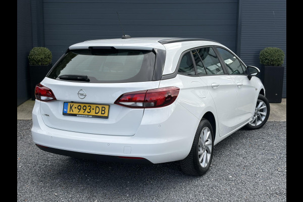 Opel Astra Sports Tourer 1.2 Edition ✓Camera ✓110pk✓2e Eigenaar✓Carplay✓Navi✓Airco✓Cruise✓Pdc✓LED koplampen✓N.A.P.✓6 Bak✓Pdc V+A✓Lm velgen✓Dakdragers ✓Comfortstoelen✓Bj 11-2020✓Apk tot 07-2028