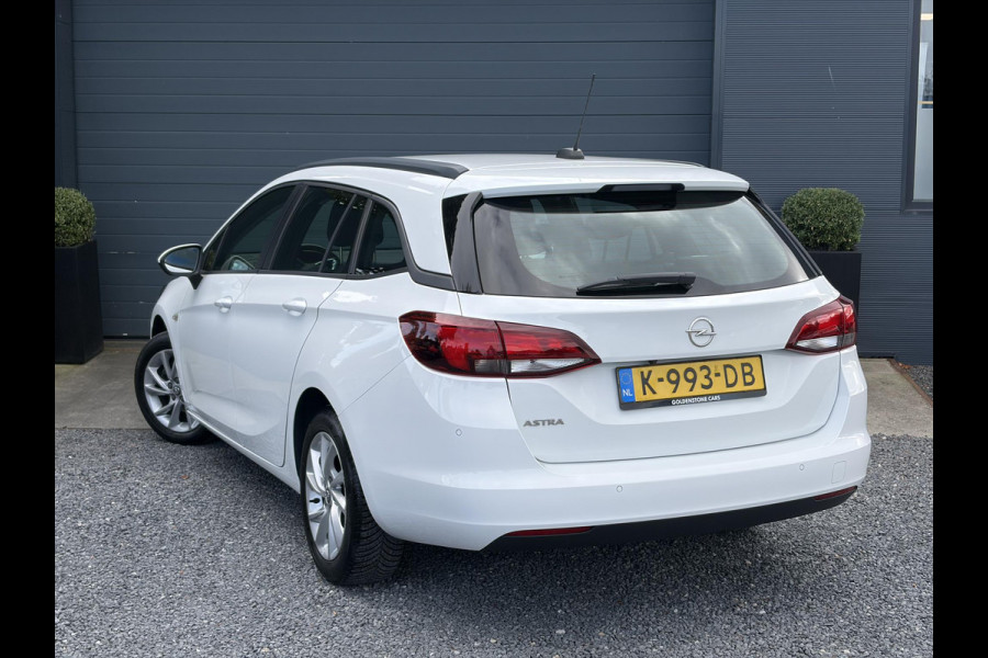 Opel Astra Sports Tourer 1.2 Edition ✓Camera ✓110pk✓2e Eigenaar✓Carplay✓Navi✓Airco✓Cruise✓Pdc✓LED koplampen✓N.A.P.✓6 Bak✓Pdc V+A✓Lm velgen✓Dakdragers ✓Comfortstoelen✓Bj 11-2020✓Apk tot 07-2028