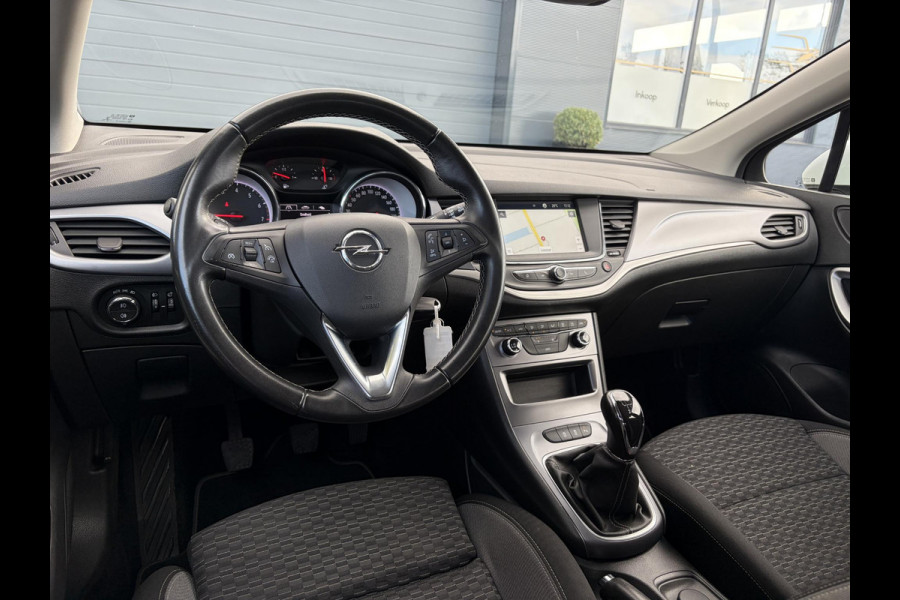 Opel Astra Sports Tourer 1.2 Edition ✓Camera ✓110pk✓2e Eigenaar✓Carplay✓Navi✓Airco✓Cruise✓Pdc✓LED koplampen✓N.A.P.✓6 Bak✓Pdc V+A✓Lm velgen✓Dakdragers ✓Comfortstoelen✓Bj 11-2020✓Apk tot 07-2028
