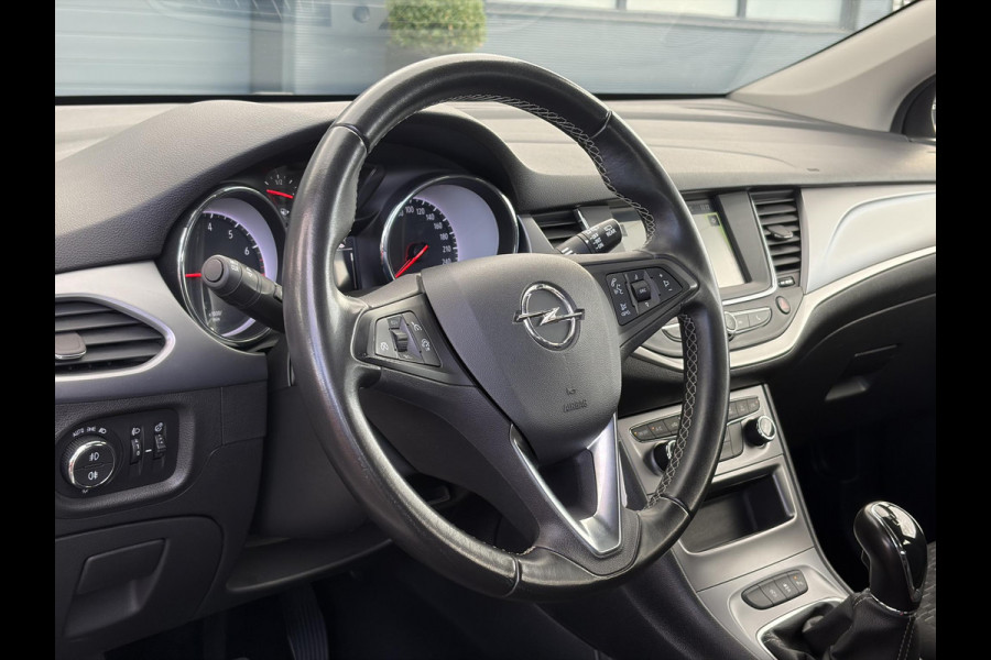 Opel Astra Sports Tourer 1.2 Edition ✓Camera ✓110pk✓2e Eigenaar✓Carplay✓Navi✓Airco✓Cruise✓Pdc✓LED koplampen✓N.A.P.✓6 Bak✓Pdc V+A✓Lm velgen✓Dakdragers ✓Comfortstoelen✓Bj 11-2020✓Apk tot 07-2028