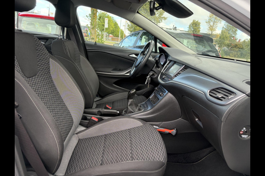 Opel Astra Sports Tourer 1.2 Edition ✓Camera ✓110pk✓2e Eigenaar✓Carplay✓Navi✓Airco✓Cruise✓Pdc✓LED koplampen✓N.A.P.✓6 Bak✓Pdc V+A✓Lm velgen✓Dakdragers ✓Comfortstoelen✓Bj 11-2020✓Apk tot 07-2028
