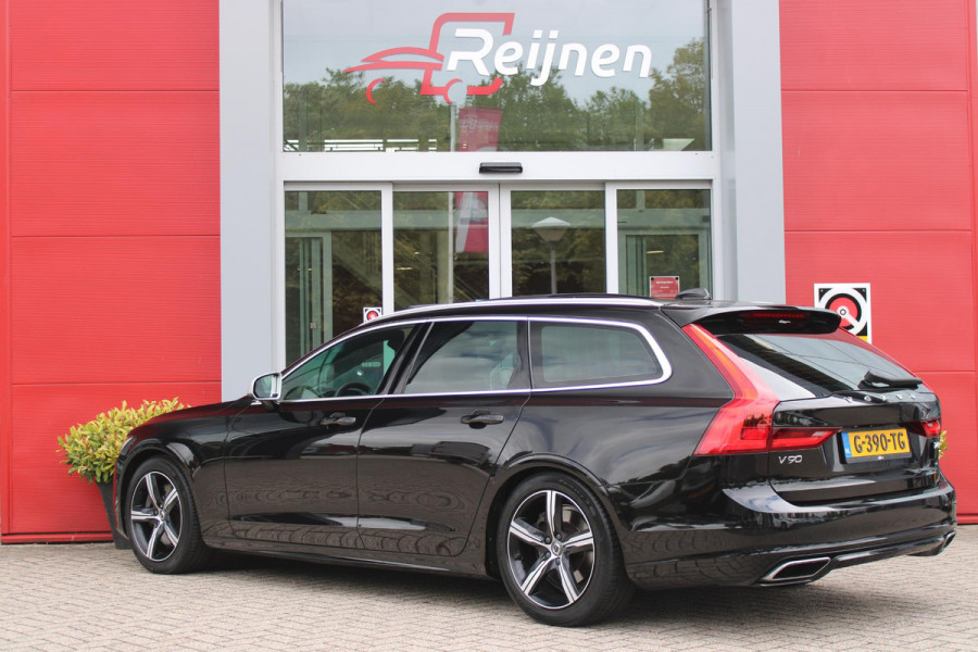 Volvo V90 2.0 T4 210PK R-DESIGN POLESTAR ENGINEERD | LUXURY LINE - PANORAMISCH SCHUIF/KANTEL DAK/HEAD-UP DISPLAY/PARK ASSIST CAMERA ACHTER/MET LEER BEKLEED DASHBOARD | PREMIUM AUDIO BY HARMAN KARDON PREMIUM AUDIO | R-DESIGN GEPERFOREERD NAPPA LEDEREN BEKLEDING MET CONTOURSTOELEN (SPORTSTOELEN) MET VERSTELBARE ZITVERLENGING | POWERSEATS -ELEKTRISCH VERSTELBARE VOORSTOELEN MET GEHEUGEN FUNCTIE OP BEIDE STOELEN | SCANDINAVIAN LINE - PARKEERVERWARMING MET TIMER (STANDKACHEL) / STOEL & STUUR VERWARMING / ACHTERBANK VERWARMING | ADAPTIVE CRUISECONTROL MET PILOT ASSIST | FULL LED KOPLA