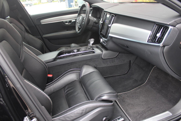 Volvo V90 2.0 T4 210PK R-DESIGN POLESTAR ENGINEERD | LUXURY LINE - PANORAMISCH SCHUIF/KANTEL DAK/HEAD-UP DISPLAY/PARK ASSIST CAMERA ACHTER/MET LEER BEKLEED DASHBOARD | PREMIUM AUDIO BY HARMAN KARDON PREMIUM AUDIO | R-DESIGN GEPERFOREERD NAPPA LEDEREN BEKLEDING MET CONTOURSTOELEN (SPORTSTOELEN) MET VERSTELBARE ZITVERLENGING | POWERSEATS -ELEKTRISCH VERSTELBARE VOORSTOELEN MET GEHEUGEN FUNCTIE OP BEIDE STOELEN | SCANDINAVIAN LINE - PARKEERVERWARMING MET TIMER (STANDKACHEL) / STOEL & STUUR VERWARMING / ACHTERBANK VERWARMING | ADAPTIVE CRUISECONTROL MET PILOT ASSIST | FULL LED KOPLA