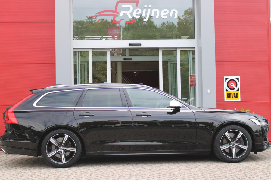 Volvo V90 2.0 T4 210PK R-DESIGN POLESTAR ENGINEERD | LUXURY LINE - PANORAMISCH SCHUIF/KANTEL DAK/HEAD-UP DISPLAY/PARK ASSIST CAMERA ACHTER/MET LEER BEKLEED DASHBOARD | PREMIUM AUDIO BY HARMAN KARDON PREMIUM AUDIO | R-DESIGN GEPERFOREERD NAPPA LEDEREN BEKLEDING MET CONTOURSTOELEN (SPORTSTOELEN) MET VERSTELBARE ZITVERLENGING | POWERSEATS -ELEKTRISCH VERSTELBARE VOORSTOELEN MET GEHEUGEN FUNCTIE OP BEIDE STOELEN | SCANDINAVIAN LINE - PARKEERVERWARMING MET TIMER (STANDKACHEL) / STOEL & STUUR VERWARMING / ACHTERBANK VERWARMING | ADAPTIVE CRUISECONTROL MET PILOT ASSIST | FULL LED KOPLA