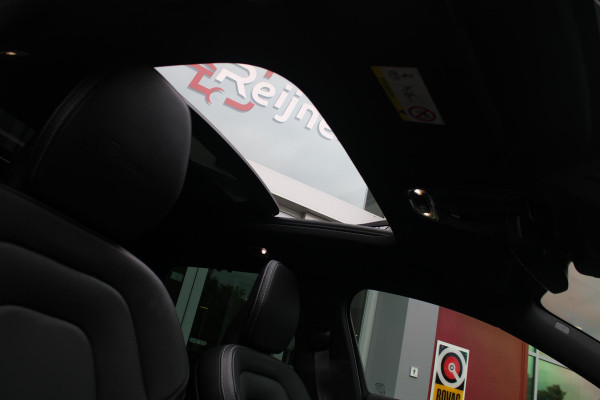 Volvo V90 2.0 T4 210PK R-DESIGN POLESTAR ENGINEERD | LUXURY LINE - PANORAMISCH SCHUIF/KANTEL DAK/HEAD-UP DISPLAY/PARK ASSIST CAMERA ACHTER/MET LEER BEKLEED DASHBOARD | PREMIUM AUDIO BY HARMAN KARDON PREMIUM AUDIO | R-DESIGN GEPERFOREERD NAPPA LEDEREN BEKLEDING MET CONTOURSTOELEN (SPORTSTOELEN) MET VERSTELBARE ZITVERLENGING | POWERSEATS -ELEKTRISCH VERSTELBARE VOORSTOELEN MET GEHEUGEN FUNCTIE OP BEIDE STOELEN | SCANDINAVIAN LINE - PARKEERVERWARMING MET TIMER (STANDKACHEL) / STOEL & STUUR VERWARMING / ACHTERBANK VERWARMING | ADAPTIVE CRUISECONTROL MET PILOT ASSIST | FULL LED KOPLA