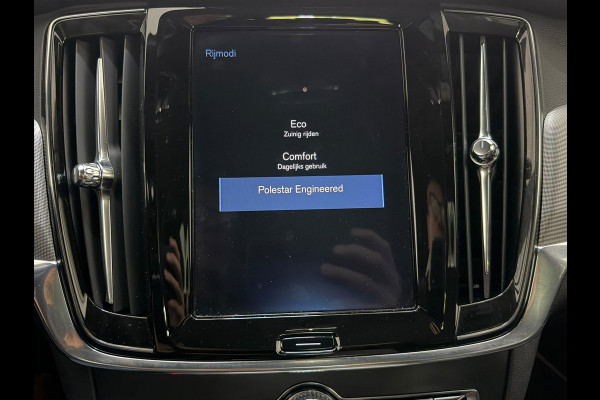 Volvo V90 2.0 T4 210PK R-DESIGN POLESTAR ENGINEERD | LUXURY LINE - PANORAMISCH SCHUIF/KANTEL DAK/HEAD-UP DISPLAY/PARK ASSIST CAMERA ACHTER/MET LEER BEKLEED DASHBOARD | PREMIUM AUDIO BY HARMAN KARDON PREMIUM AUDIO | R-DESIGN GEPERFOREERD NAPPA LEDEREN BEKLEDING MET CONTOURSTOELEN (SPORTSTOELEN) MET VERSTELBARE ZITVERLENGING | POWERSEATS -ELEKTRISCH VERSTELBARE VOORSTOELEN MET GEHEUGEN FUNCTIE OP BEIDE STOELEN | SCANDINAVIAN LINE - PARKEERVERWARMING MET TIMER (STANDKACHEL) / STOEL & STUUR VERWARMING / ACHTERBANK VERWARMING | ADAPTIVE CRUISECONTROL MET PILOT ASSIST | FULL LED KOPLA