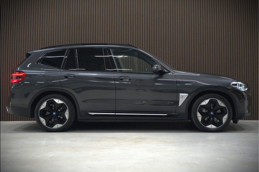 BMW iX3 High Executive 80 kWh | Panoramadak | Harman Kardon | Stoelverwarming | Adaptive Cruise Control | Head-Up Display | Memory Seat | 360 Camera | Ambiance Verlichting | Adaptief Onderstel | Adaptive LED | Trekhaak |