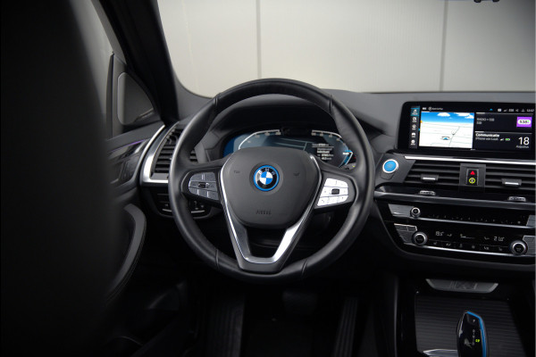 BMW iX3 High Executive 80 kWh | Panoramadak | Harman Kardon | Stoelverwarming | Adaptive Cruise Control | Head-Up Display | Memory Seat | 360 Camera | Ambiance Verlichting | Adaptief Onderstel | Adaptive LED | Trekhaak |