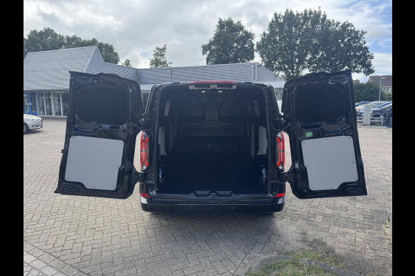 Ford E-Transit Custom 340 L2H1 Limited 71 kWh | SCI | 218pk | Laadvloer bescherming | 12-weg verstel- en verwarmbare AGR bestuurders- en passagiersstoel Laadvloer bescherming,12-weg verstel- en verwarmbare AGR bestuurders- en passagiersstoel | Trekhaakvoorbereiding | 17 inch lichtmetalen velgen (Carbonised Grey) | Driver Assistent Pack Ultimate | AGM accu | BEV 3-fase oplaadkabel (mode 3, 32A, 10m)