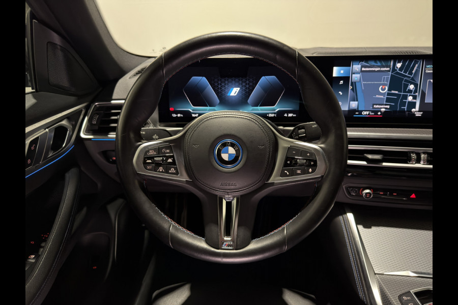 BMW i4 M50 84 kWh M Sport Pro | SOH 97,6% | el. Schuif/kanteldak | el. stoelen met memory | HUD | Unieke kleur