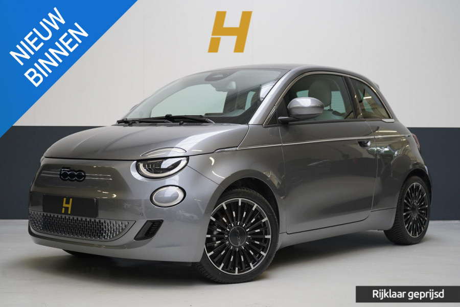Fiat 500E La Prima 42 kWh | SoH 98,4% | Stoelverwarming | Navigatie | Leder | Lm velgen | All-seasonbanden