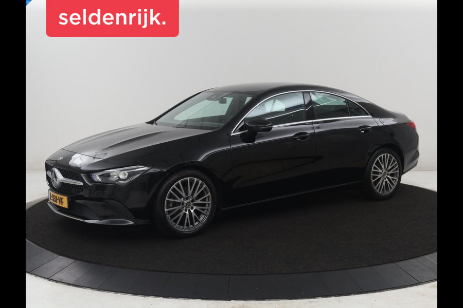 Mercedes-Benz CLA-Klasse 180 Business Solution Luxury | Leder | Stoelverwarming | Cruise control | Sfeerverlichting | Navigatie | Bluetooth | Camera | Park assist | Climate control