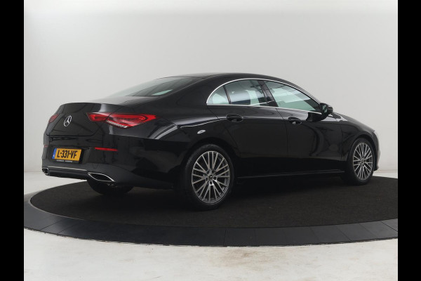 Mercedes-Benz CLA-Klasse 180 Business Solution Luxury | Leder | Stoelverwarming | Cruise control | Sfeerverlichting | Navigatie | Bluetooth | Camera | Park assist | Climate control
