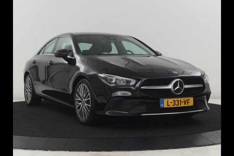Mercedes-Benz CLA-Klasse 180 Business Solution Luxury | Leder | Stoelverwarming | Cruise control | Sfeerverlichting | Navigatie | Bluetooth | Camera | Park assist | Climate control