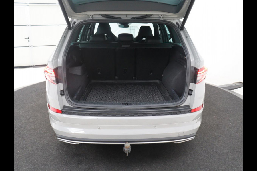 Škoda Kodiaq 1.5 TSI Sportline Business | Leder | Memory | Adaptive cruise | Stoelverwarming | Camera | Park assist | Sfeerverlichting | Bluetooth | Navigatie | Elektrische achterklep | Trekhaak