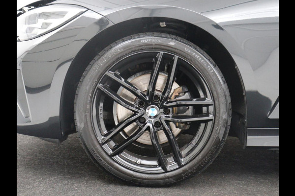 BMW 3-serie 320i Executive Edition | Half leder | Cruise control | Navigatie | Bluetooth | Carplay | Park assist | Interieurverlichting | Virtueel dashboard | Climate control | Full LED | 18" velgen