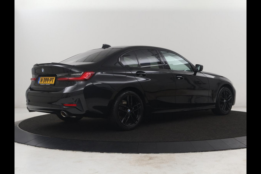 BMW 3-serie 320i Executive Edition | Half leder | Cruise control | Navigatie | Bluetooth | Carplay | Park assist | Interieurverlichting | Virtueel dashboard | Climate control | Full LED | 18" velgen