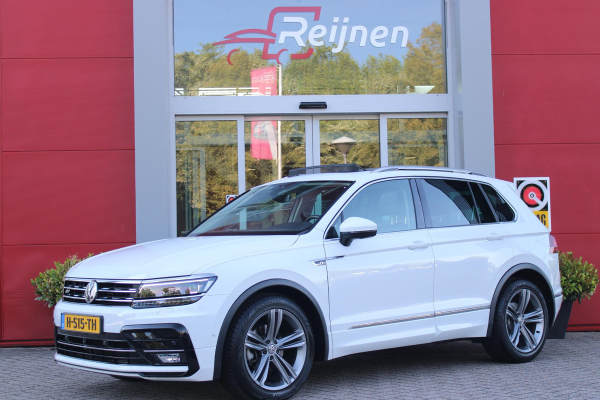 Volkswagen Tiguan 1.5 TSI 150PK AUTOMAAT HIGHLINE BUSINESS R | PANORAMA SCHUIF/KANTEL DAK | LEDEREN BEKLEDING | BESTUUDERSSTOEL ELEKTRISCH VERSTELBAAR MET GEHEUGENFUNCTIE | ELEKTRISCH WEGKLAPBARE TREKHAAK | IQ LIGHT KOPLAMPEN | VIRTUAL DISPLAY | DRAADLOZE APPLE CARPLAY/ANDROID AUTO | NAVIGATIE | 19" LICHTMETALEN VELGEN | ELEKTRISCH BEDIENBARE ACHTERKLEP | GETINTE ACHTERRUITEN | CAMERA VOOR + ACHTER | PARKEERSENSOREN VOOR + ACHTER | STOEL VERWARMING |