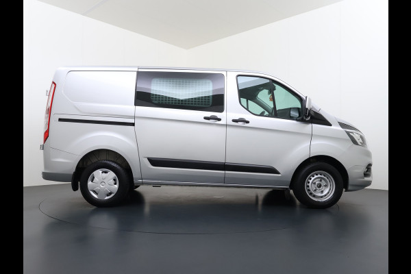 Ford Transit Custom 280 2.0TDCI 130PK Euro 6 L1H1 3-Persoons Navi Airco Cruise Control Bluetooth DAB Pdc Trend Betonplex Vloer Wandbetimmering Schuifdeur+Raam Achterdeuren+Ramen 1e Eigenaar