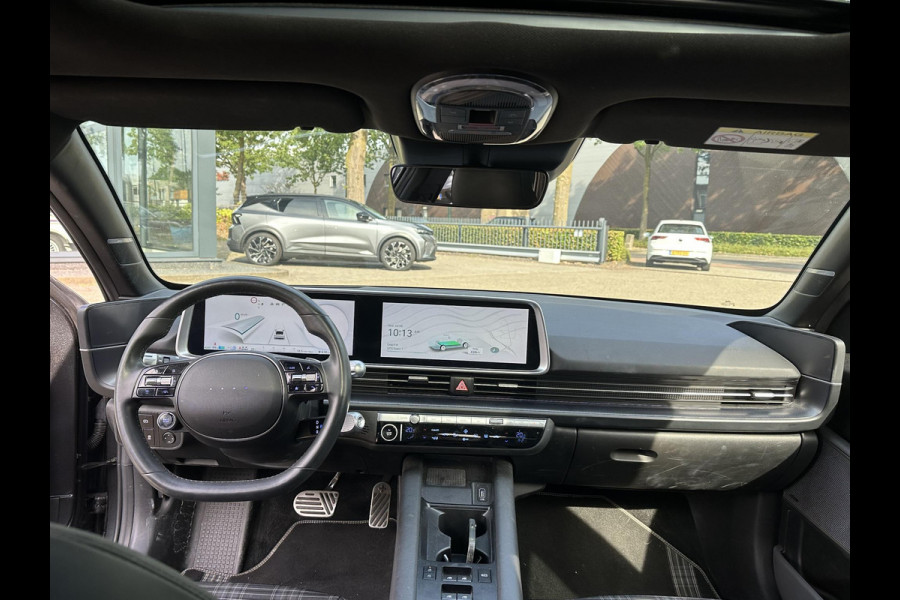 Hyundai IONIQ 6 First Edition AWD 77.4 kWh SOH 100% | PANO | STOEL VERWAMRING VOOR & ACHTER | MEM. SEAT | ELEK. STOELEN | BOSE BOXEN | 360 CAMERA | FABRIEKS GARANTIE TM 03-2028 | RIJKLAAR ! |