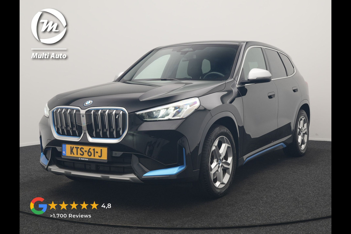 BMW iX1 xDrive30 X Line 67 kWh 313pk Dealer O.H. | Trekhaak Af Fabriek | Adaptive Cruise | Lederen Sportstoelen Massage & Verwarmd | Camera | Adaptief M-onderstel | Blis | Sfeerverlichting | Apple Carplay | Navigatie | DAB |