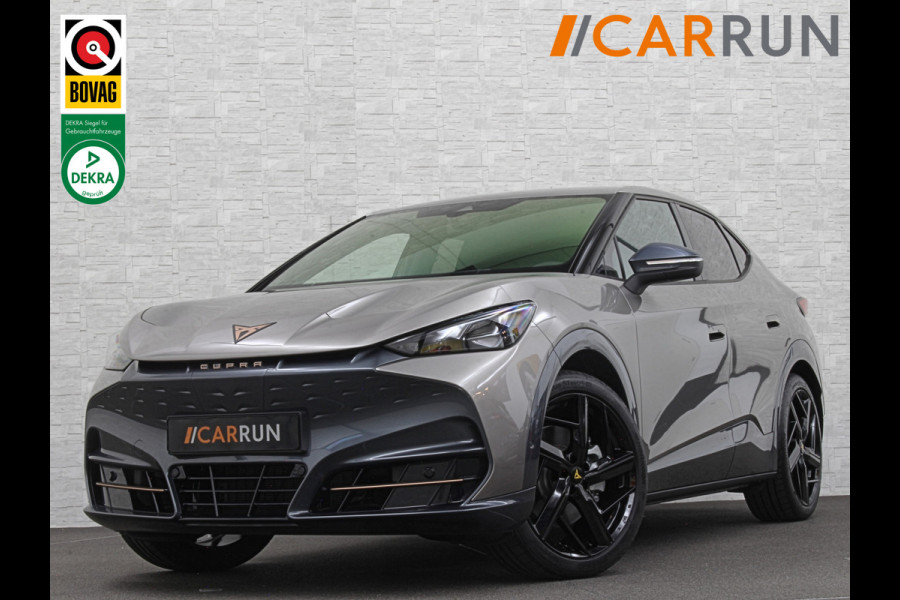 CUPRA Tavascan 286pk 77 kWh | Nieuw! | Winter-Pack | Warmtepomp | Verlengde Fabrieksgarantie | 7x Op Voorraad | Adaptive Cruise Control | 3-Zone Clima | Verwarmde Voorruit | Keyless-Entry | Sfeerverlichting | Stoelverwarming | Carplay | Stuurverwarming | Getint Glas | 19 inch | Lane-Assist | Camera | Draadloos Laden |