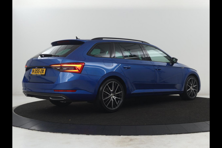 Škoda Superb Combi 1.5 TSI ACT Sportline Business | Leder/alcantara | Memory | Stoelverwarming | Virtueel dashboard | Park assist | Carplay | Navigatie | Climate control | Sfeerverlichting | Elektrische achterklep