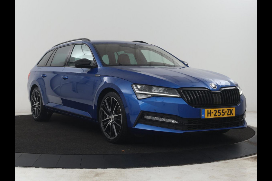 Škoda Superb Combi 1.5 TSI ACT Sportline Business | Leder/alcantara | Memory | Stoelverwarming | Virtueel dashboard | Park assist | Carplay | Navigatie | Climate control | Sfeerverlichting | Elektrische achterklep