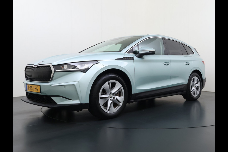 Škoda ENYAQ iV 80 204PK Leder Trekhaak Adap.Cruise Stoel+Stuurverwarming Camera 3-Zone Ecc Elek.Achterklep Keyless Apple Carplay Android Auto N Comfort plus-pakket  Assistentie Pakket Climate-pakket P-Assist Lmv Led Isofix Privacy Glas 1.000KG Trekgewicht 1e Eigenaar Origineel Nederlandse Auto