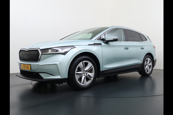 Škoda ENYAQ iV 80 204PK Leder Trekhaak Adap.Cruise Stoel+Stuurverwarming Camera 3-Zone Ecc Elek.Achterklep Keyless Apple Carplay Android Auto N Comfort plus-pakket  Assistentie Pakket Climate-pakket P-Assist Lmv Led Isofix Privacy Glas 1.000KG Trekgewicht 1e Eigenaar Origineel Nederlandse Auto