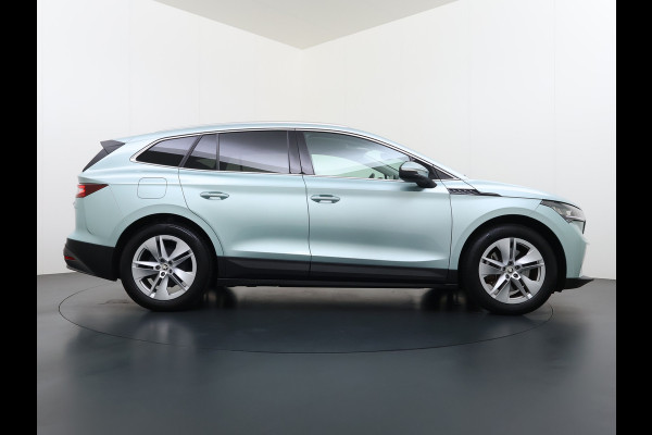 Škoda ENYAQ iV 80 204PK Leder Trekhaak Adap.Cruise Stoel+Stuurverwarming Camera 3-Zone Ecc Elek.Achterklep Keyless Apple Carplay Android Auto N Comfort plus-pakket  Assistentie Pakket Climate-pakket P-Assist Lmv Led Isofix Privacy Glas 1.000KG Trekgewicht 1e Eigenaar Origineel Nederlandse Auto