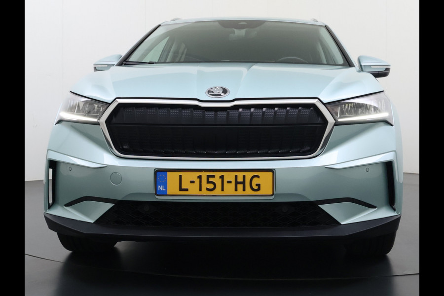 Škoda ENYAQ iV 80 204PK Leder Trekhaak Adap.Cruise Stoel+Stuurverwarming Camera 3-Zone Ecc Elek.Achterklep Keyless Apple Carplay Android Auto N Comfort plus-pakket  Assistentie Pakket Climate-pakket P-Assist Lmv Led Isofix Privacy Glas 1.000KG Trekgewicht 1e Eigenaar Origineel Nederlandse Auto