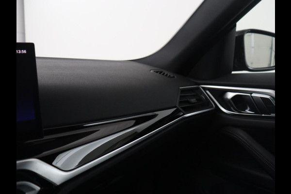 BMW i4 eDrive40 High Executive 84 kWh | SOH 98,7% | Leder | Adaptive cruise | Dodehoek detectie | Head-up | Stoelverwarming | Sfeerverlichting | Carplay | 3 zone klimaat | Camera | Park assist | Elektrische achterklep