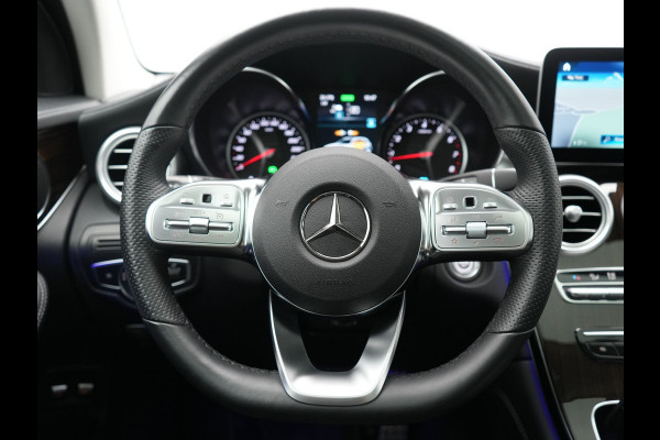 Mercedes-Benz GLC 300e 4MATIC Business Solution AMG PHEV 313pk Dealer O.H. | Trekhaak Af Fabriek | Panodak | Multi Beam LED | Alcantara Sportstoelen Verwarmd | Blis | Camera | Keyless | Sfeerverlichting | Apple Carplay | Navigatie | DAB | Cruise Control | Plug In Hybrid |