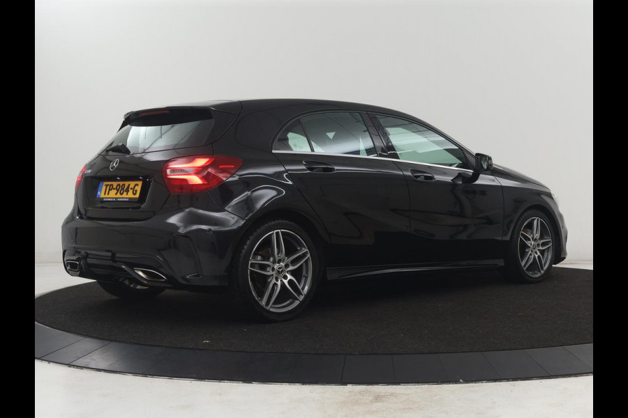 Mercedes-Benz A-Klasse 180 Business Solution AMG | Leder/alcantara | Stoelverwarming | Cruise control | Navigatie | Bluetooth | Camera | Park assist | Trekhaak