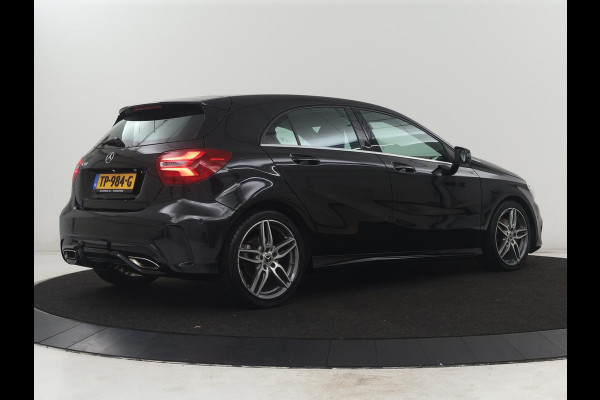 Mercedes-Benz A-Klasse 180 Business Solution AMG | Leder/alcantara | Stoelverwarming | Cruise control | Navigatie | Bluetooth | Camera | Park assist | Trekhaak