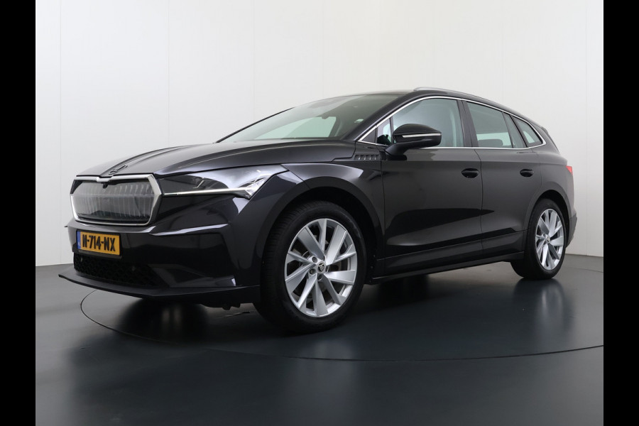 Škoda ENYAQ iV 80 204PK Chrystal Face Sport Pakket Trekhaak SOH 91% Stoel+Stuurverwarming 3-Zone Ecc Camera Apple Carplay Android Auto Navi Led Matrix Rijstrooksensor Isofix Keyless 1.000KG Trekgewicht Origineel Nederlandse Auto