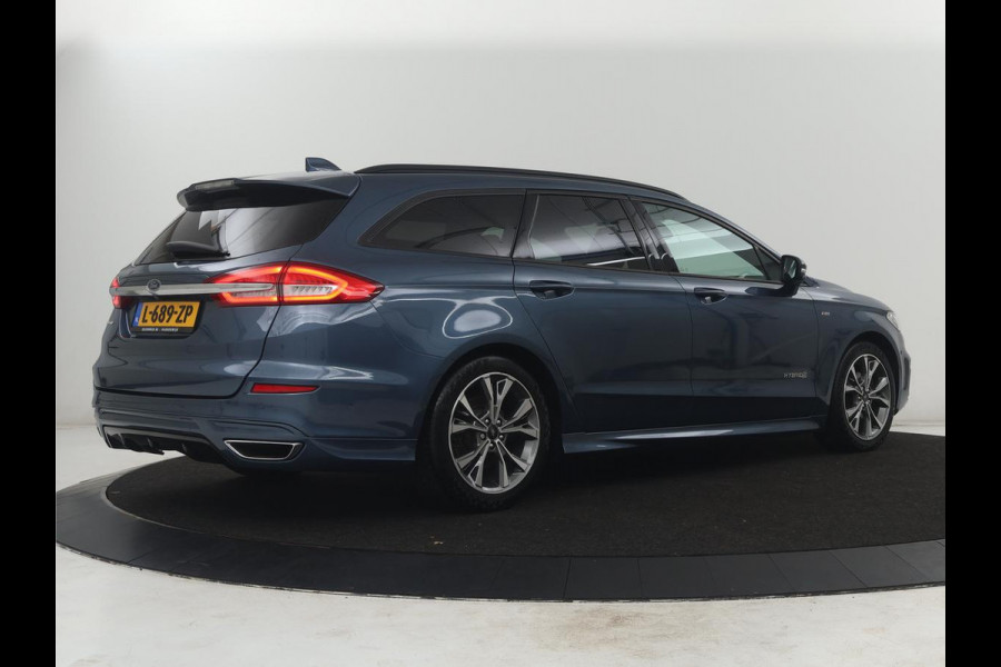 Ford Mondeo Wagon 2.0 IVCT HEV Vignale | Leder/alcantara | Memory | Cruise control | Dodehoek detectie | Stuur/stoel verwarming | Achterbank verwarming | Carplay | Camera | Park assist | Elektrische achterklep