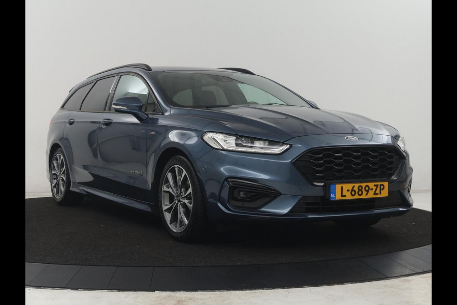 Ford Mondeo Wagon 2.0 IVCT HEV Vignale | Leder/alcantara | Memory | Cruise control | Dodehoek detectie | Stuur/stoel verwarming | Achterbank verwarming | Carplay | Camera | Park assist | Elektrische achterklep