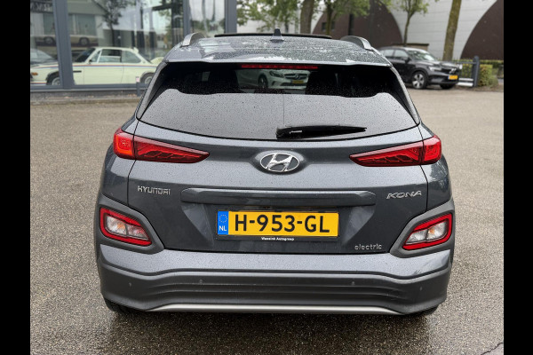 Hyundai Kona EV Premium 64 kWh SOH 94% | ORIGINEEL NL AUTO | 3-FASE LADEN | WARMTEPOMP| SCHUIFDAK | LEREN BEKLEDING | STOEL- + STUURERWARMING | KRELL PREMIUM AUDIO | HEAD-UP DISPLAY | STOELVENTILATIE | AFNEEMBARE TREKHAAK | CAMERA | ACHTERBANKVERWARMING | ALL-SEASON BANDEN | HYUNDAI DEALER ONDERHOUDEN | 12 MND. BOVAG GARANTIE