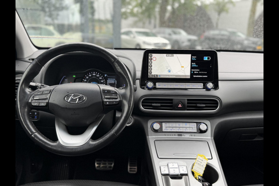 Hyundai Kona EV Premium 64 kWh SOH 94% | ORIGINEEL NL AUTO | 3-FASE LADEN | WARMTEPOMP| SCHUIFDAK | LEREN BEKLEDING | STOEL- + STUURERWARMING | KRELL PREMIUM AUDIO | HEAD-UP DISPLAY | STOELVENTILATIE | AFNEEMBARE TREKHAAK | CAMERA | ACHTERBANKVERWARMING | ALL-SEASON BANDEN | HYUNDAI DEALER ONDERHOUDEN | 12 MND. BOVAG GARANTIE