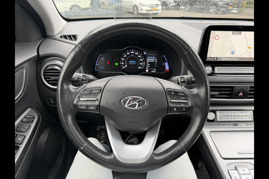 Hyundai Kona EV Premium 64 kWh SOH 94% | ORIGINEEL NL AUTO | 3-FASE LADEN | WARMTEPOMP| SCHUIFDAK | LEREN BEKLEDING | STOEL- + STUURERWARMING | KRELL PREMIUM AUDIO | HEAD-UP DISPLAY | STOELVENTILATIE | AFNEEMBARE TREKHAAK | CAMERA | ACHTERBANKVERWARMING | ALL-SEASON BANDEN | HYUNDAI DEALER ONDERHOUDEN | 12 MND. BOVAG GARANTIE