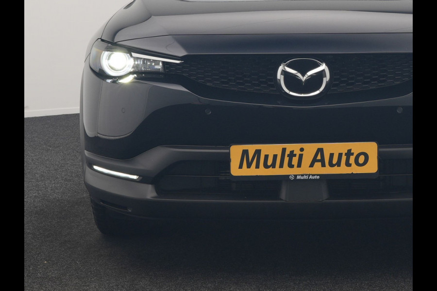 Mazda MX-30 e-SkyActiv R-EV 170 Makoto PHEV 170pk | Trekhaak Afn. | Panodak | Adaptive Cruise | Head Up | 360 Camera | Bose Audio | Lederen Sportstoelen Memory & Verwarmd | Keyless | Blis | Stuur Verwarmd | Navigatie | DAB | Plug In Hybrid |