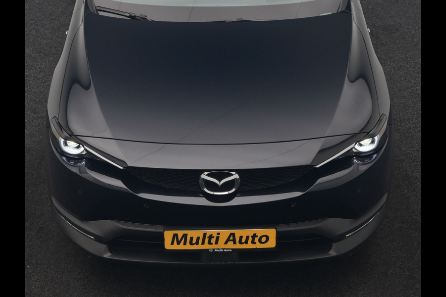 Mazda MX-30 e-SkyActiv R-EV 170 Makoto PHEV 170pk | Trekhaak Afn. | Panodak | Adaptive Cruise | Head Up | 360 Camera | Bose Audio | Lederen Sportstoelen Memory & Verwarmd | Keyless | Blis | Stuur Verwarmd | Navigatie | DAB | Plug In Hybrid |